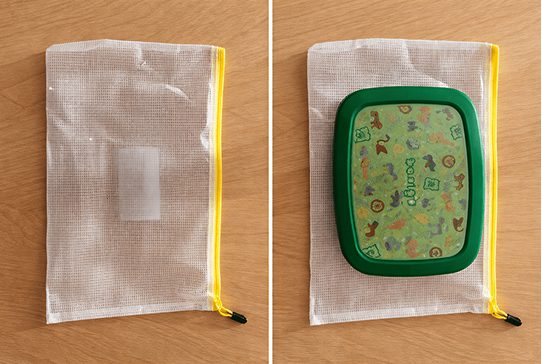 Two mesh zipper pouches, one empty and one with a green device inside.